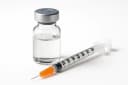 Compounded semaglutide vial and syringe — editorial product photography
